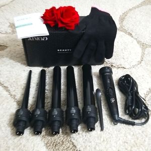 Interchangeable iron w/five curling barrels